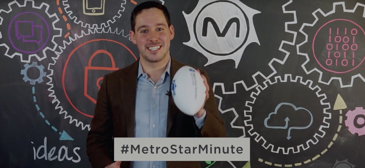 Metro Star Minute screenshot of scrum master holding a metrostar football